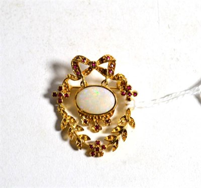Lot 26 - A 9 carat gold opal and ruby articulated garland brooch, measures 3.5cm by 3cm