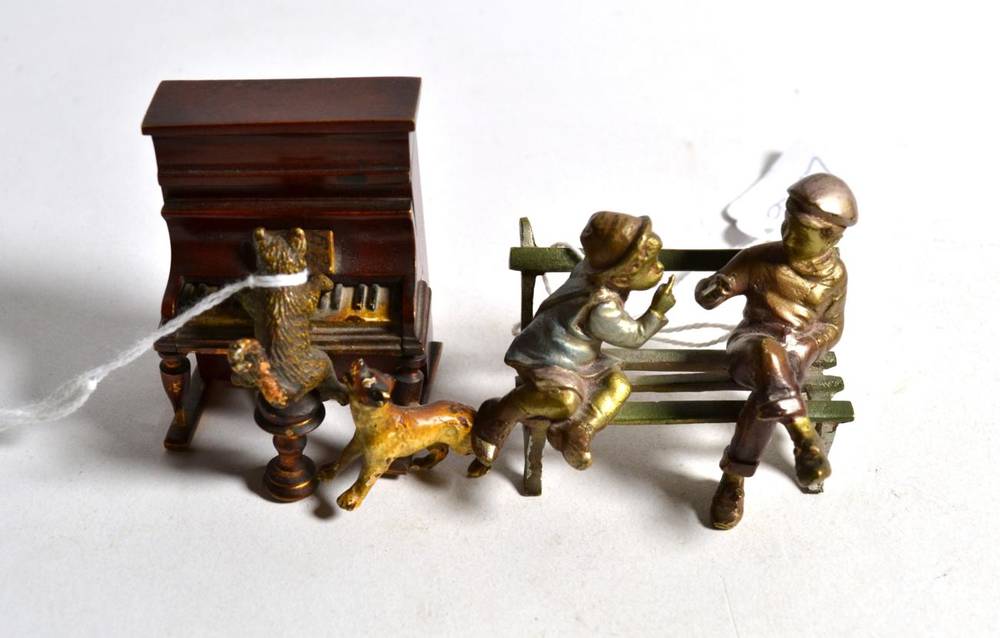 Lot 41 - An Austrian cold painted bronze match box holder, early 20th century, in the form of a cat...