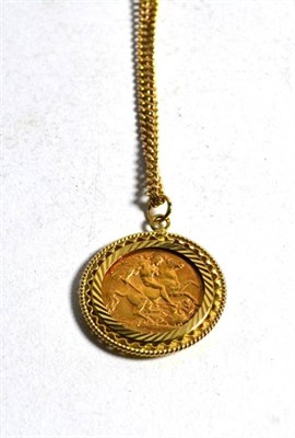 Lot 60 - A half sovereign pendant on a 9 carat gold chain, pendant length 2.9cm, chain length 46cm