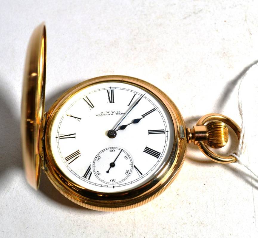 Lot 64 - A gold plated half hunter pocket watch signed Waltham