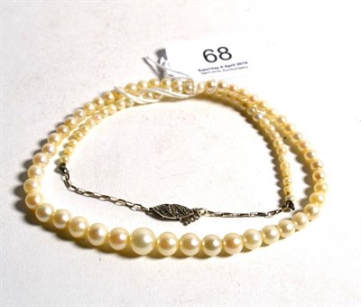 Lot 68 - A cultured pearl necklace, with a diamond set snap, length 50cm