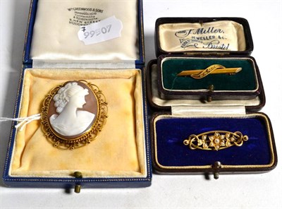 Lot 89 - A cameo brooch, measures 4.75cm by 4cm; a seed pearl floral motif bar brooch, unmarked, length...