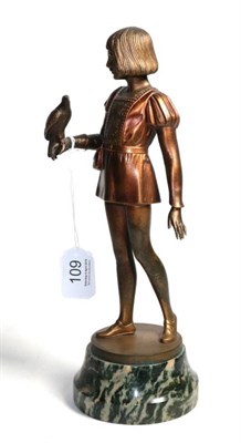 Lot 109 - French School (early 20th century) Art Deco figure of a page with bird of prey, signed G...