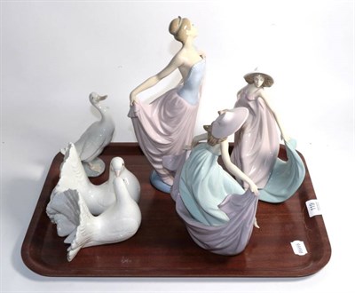 Lot 119 - Five Lladro china figures comprising three of classical ladies, one of a dove group and one goose