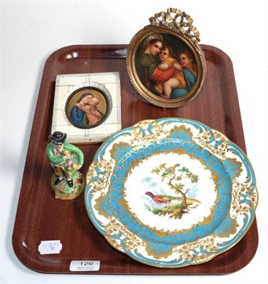Lot 126 - A Sevres style dessert plate decorated with exotic birds and with gilt highlighting, a late...