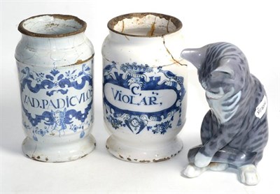 Lot 140 - Two 18th century Delft apothecary jars (a.f.), together with a Royal Copenhagen cat (3)