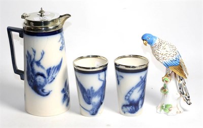 Lot 146 - Victorian blue and white pottery jug with plated mount and two beakers; together with a model...