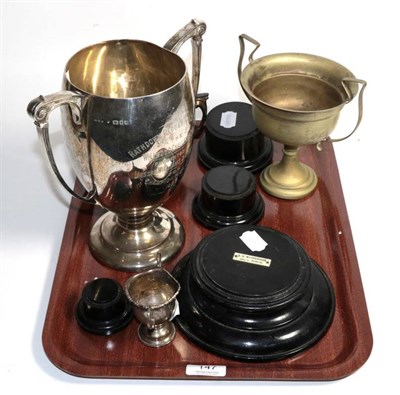 Lot 147 - Three silver trophy cups and a plated example with four plinths