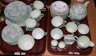 Lot 148 - A Shelley 'Melody' pattern part teaset comprising a teapot, twelve cups and saucers, eleven...