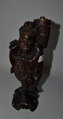 Lot 159 - A carved hardwood figure