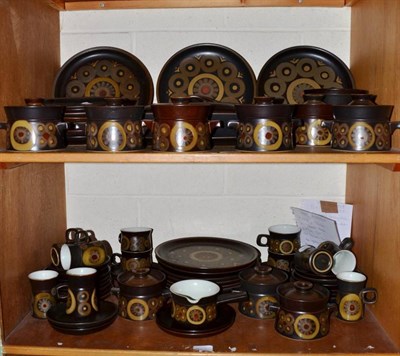 Lot 165 - A collection of approximately eighty items of Denby Arabesque pattern dinner wares (two shelves)