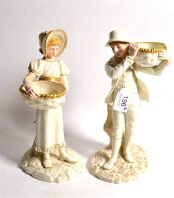Lot 196 - A pair of Royal Worcester figures, lady and gent carrying baskets, model No. 880, 26cm high