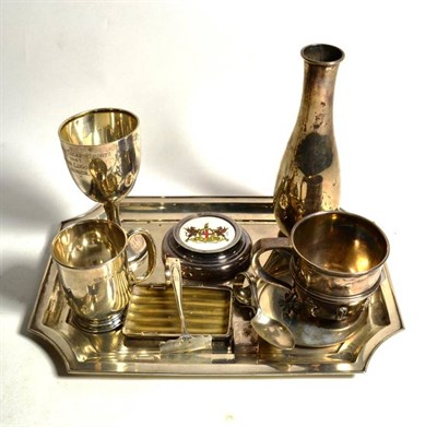 Lot 212 - A collection of silver and plate including a dressing table tray; vase; paperweight; baby spoon and