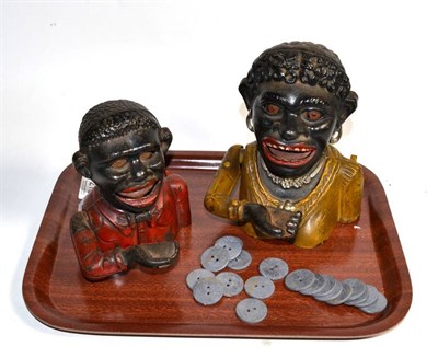 Lot 213 - Two cast metal money boxes, Little Joe and Dinah, together with a quantity of tokens