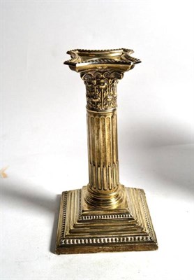 Lot 228 - Silver candlestick with loaded base