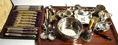 Lot 249 - A group of assorted silver and white metal items to include a beaker, tea strainer, ladle etc,...