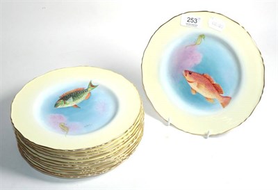 Lot 253 - A set of twelve Royal Worcester plates each hand painted with fish, signed H Ayrton, all dated 1934