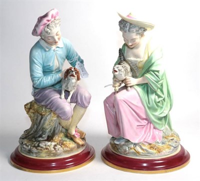 Lot 254 - A pair of Royal Worcester figures 'Cat' and 'Dog', number 571, modelled as a lady and gentleman...