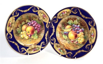 Lot 265 - A pair of T G Abbotts for Lynton Porcelain fruit painted plates, signed, 27cm