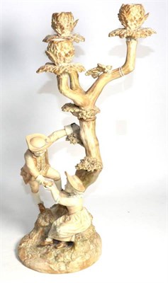 Lot 284 - A Victorian Royal Worcester figural candelabra, circa 1890, modelled by James Hadley, 50cm high