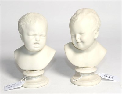 Lot 285 - A pair of 19th century Copeland Parian ware busts of young children, entitled ''Happy & Sad'',...