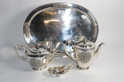 Lot 288 - A Thai silver part tea and coffee service with tray, marked 'Thai Nakon Sterling Siam', with panels