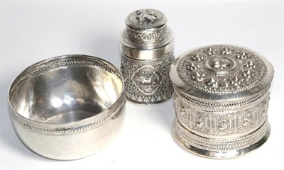 Lot 292 - A South East Asian white metal circular box and cover, a similar jar and cover and a circular bowl