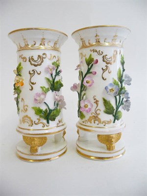 Lot 125 - A Pair of Coalbrookdale Porcelain Cylindrical Vases, circa 1830, with flared rim, applied with...