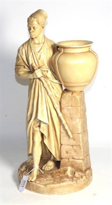 Lot 303 - A Royal Worcester porcelain figure of a water carrier, dated 1884, modelled by James Hadley,...