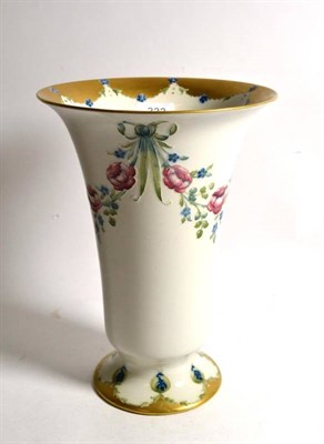 Lot 333 - A William Moorcroft for Macintyre trumpet vase decorated with floral swags and gilt rims, signed in