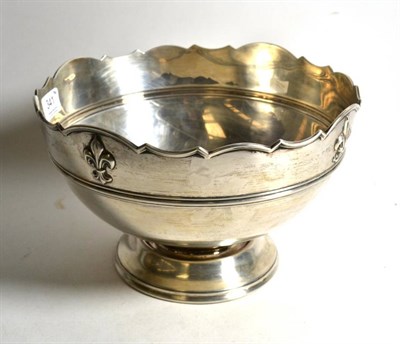 Lot 341 - A silver pedestal punch bowl, John Round, Sheffield, with fleurs de lys decoration