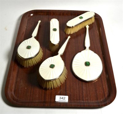 Lot 342 - A silver and enamel dressing table set comprising of a hand mirror and four brushes