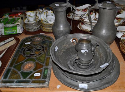 Lot 343 - Assorted 18th century and later British pewter, together with two leaded window panels  (qty)