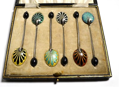 Lot 354 - A cased set of silver and enamel coffee bean spoons by Henry Clifford Davis, Birmingham 1923