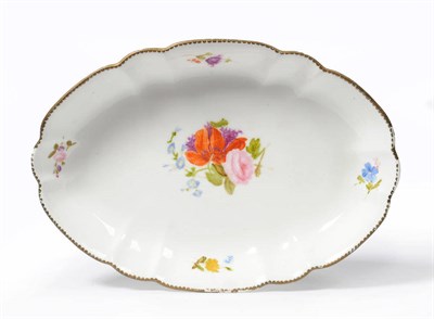 Lot 131 - A Nantgarw Porcelain Oval Dish, circa 1820, painted with a central flower spray and scattered...