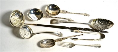 Lot 359 - A silver replica anointing spoon by Saunders & Shepherd; a pair of silver apostle top spoon; a...