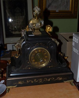 Lot 385 - A black slate mantel clock