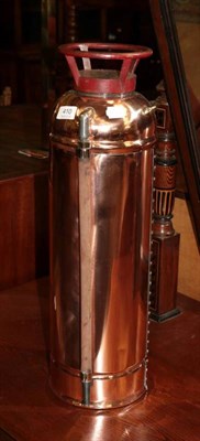 Lot 410 - A polished copper fire extinguisher, with brass plaque