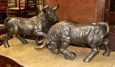 Lot 411 - Two Grecian style resin models of bulls with bronzed finish