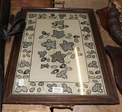Lot 1112 - An embroidered tea tray