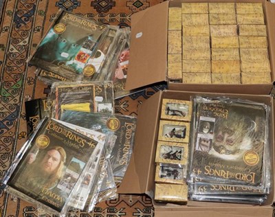 Lot 1128 - Lord of the Rings, M.M.V. New Line Productions, sixty-two figures and games boards, in original...