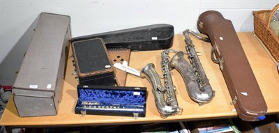 Lot 1150 - A group of musical instruments including saxophones; trombones; zither; flute etc