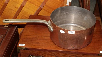 Lot 1179 - A large copper pan by Elkington & Co, stamped G W R Hotels