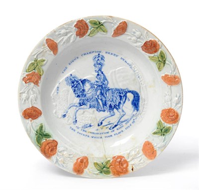 Lot 158 - A Rare Pearlware QUEEN CAROLINE Nursery Plate, circa 1820, moulded with a titled bust portrait...