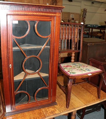 Lot 1237 - An Edwardian Sheraton revival corner cabinet; and a spindle back chair with upholstered seat