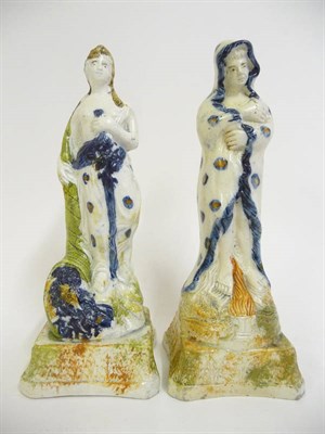 Lot 160 - A Pair of Prattware Pottery Figures, circa 1800, depicting Summer and Winter, each picked out...