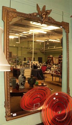 Lot 1261 - A Victorian gilt and gesso over mantle mirror, 145cm by 112cm