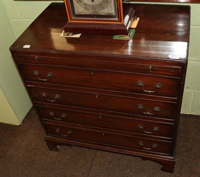 Lot 1265 - A 20th century mahogany caddy top bachelors chest with brushing slide