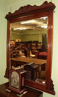 Lot 1266 - A late Victorian walnut bevelled glass over mantle mirror, circa 1900, 149cm by 118cm