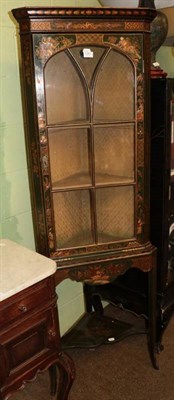 Lot 1281 - A 19th century green lacquered and chinoiserie corner cabinet, integral cornice, glazed door,...